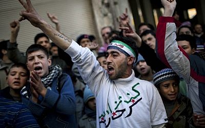 Anti-Assad protest in Syria (photo credit: AP Photo/Rodrigo Abd)