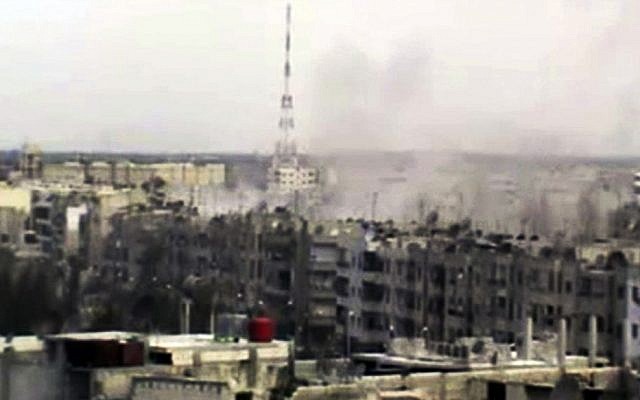 Shelled buildings in Homs as captured by an amateur photographer Sunday   (photo credit: AP Photo/Shaam News Network)