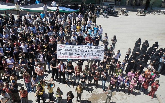 Syrians chant slogans during a demonstration in Kafranbel near Idlib, north Syria, Wenesday (photo credit: AP/Local Coordination Committees in Syria)