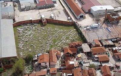 Arial photographs of the Nis cemetery surrounded by the new construction and the Roma village. (Photo courtesy of Ivan Ceresnjes/JTA)