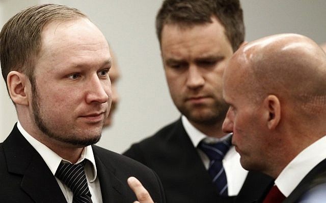 Anders Breivik (left) with his lawyers in court on Wednesday (photo credit: Lise Aserud/AP)
