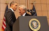 Then US president Barack Obama embraces Elie Wiesel before delivering a speech about the Holocaust and its meaning at the US Holocaust Memorial Museum, April 23, 2012. (Courtesy USHMM/JTA)