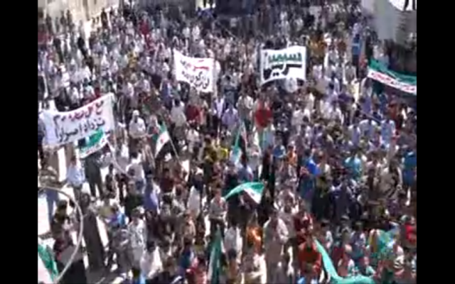 Image capture of Syrian protesters on Friday from a YouTube video.