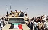 Sudanese President Omar Al-Bashir addressing a military unit in April, 2012. (photo credit: AP/Abd Raouf)