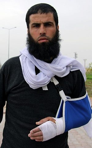 Newly arrived Abdul Rahman Al-Atiq, a Syrian refugee seen in a camp in Reyhanli, Turkey on Monday, April 9, 2012 (photo credit: AP/Germano Assad)
