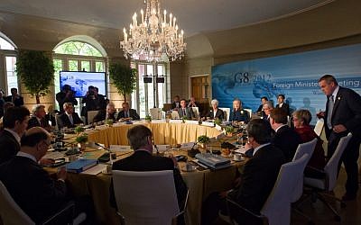 Secretary of State Hillary Rodham Clinton addresses the G8 foreign ministers at the start of a working session at Blair House in Washington, Wednesday, April 11, 2012. (photo credit: AP/J. Scott Applewhite)