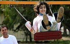 The World Happiness Report found that stable family life and enduring marriages are important factors in measuring the happiness of parents and children (photo credit: Nati Shohat/Flash90)