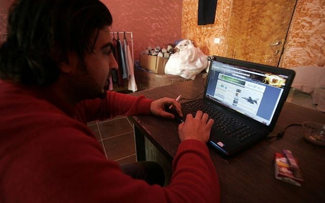 A Palestinian man using the Internet. (photo credit: Abed Rahim Khatib / Flash90) A Palestinian man using the Internet. (photo credit: Abed Rahim Khatib / Flash90)