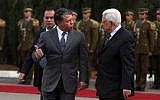 Jordan's King Abdullah (left), pictured with Palestinian Authority President Mahmoud Abbas on a visit to Ramallah in November, 2011. (Issam Rimawi/Flash90)