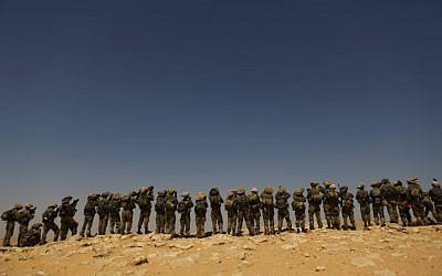 Infantry soldiers of the Givati brigade train in the Negev desert in 2011 (photo credit: Tsafrir Abayov/Flash90)