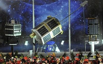 Models of Iranian-built satellites on display in Tehran (photo credit: AP) Models of Iranian-built satellites on display in Tehran (photo credit: AP)