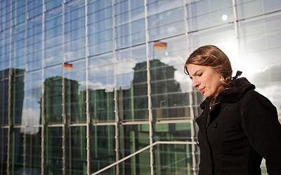 Marina Weisband standing in front of the German Bundestag. Chances are that in one year's time she will be among those sitting inside the parliament (photo credit:  CC-BY: Tobias M. Eckrich)