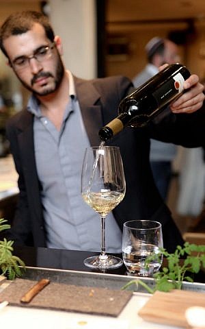 Pouring some Asif (Courtesy Asif Winery) Pouring some Asif (Courtesy Asif Winery)