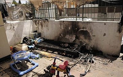 A courtyard in southern Tel Aviv damaged in a Molotov cocktail attack in April 2012.(photo credit: Tomer Neuberg/Flash90)