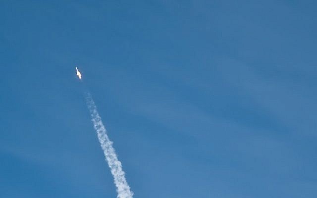 A satellite being launched into space. (photo credit: CC-BYpuliarf, Flickr)