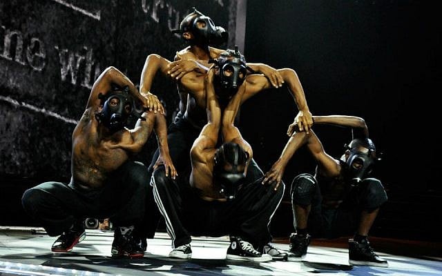 The gas-masked dancers (Courtesy official Madonna Facebook page)