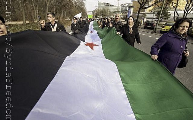 A protest outside the Syrian Embassy in Berlin in March. (photo credit: CC-BY FreedomHouse2, Flickr)