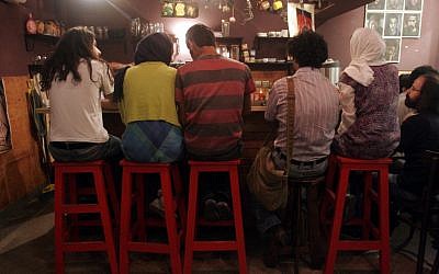 Iranian youths sit at a cafe in Tehran (AP/Hasan Sarbakhshian)