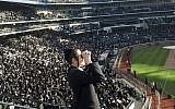 Ultra-Orthodox Jews at Citi Field in New York gather to discuss Internet usage. (photo credit: AP/VosIzNeias.com