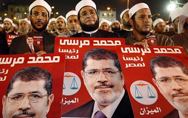 Several hundreds Imams listen to Muslim Brotherhood's presidential candidate Mohammed Morsi at a rally in Cairo, Egypt, Sunday, May 20, 2012 (photo credit: AP Photo/Fredrik Persson)