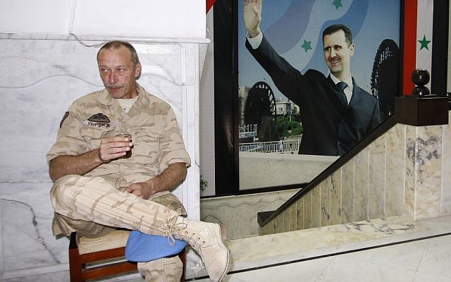 UN observer in Syria. Led by the nose? (photo credit: AP Photo/Muzaffar Salman)