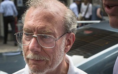 Stan Patz, father of missing child Etan Patz, arrives at his home in SoHo, New York, on Friday. New life has been breathed into the case after Pedro Hernandez implicated himself in the death of 6-year-old Etan Patz, whose disappearance 33 years ago on his way to school helped launch a missing children's movement that put kids' faces on milk cartons. (photo credit: AP/John Minchillo)