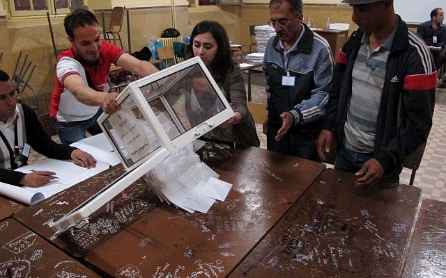 As parliamentary elections unfolded across Algeria on Thursday, voting was light for much of day in the capital, despite these contests being billed the freest in 20 years. (photo credit: AP/Paul Schemm)