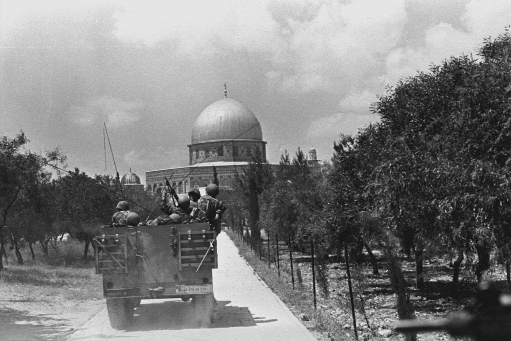 Col. Motta Gur's halftrack, after breaking through Lion's Gate, on Temple Mount heading for the Dome of the Rock, June 1967 (photo credit: Bamahane) Col. Gur's halftrack, after breaking through Lion's Gate, on Temple Mount heading for the Dome of the Rock (photo credit: Bamahane)