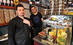 Eitan and Yomi Yom Tov of the Yom Tov Delicatessen in the Levinsky Spice Market in Tel Aviv (photo credit: David Katz)