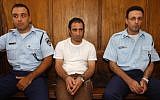 Hagai Amir, accomplice and brother of Rabin assassin Yigal Amir, in court in 2002.  He was released today after sixteen years in jail.  (photo credit: Flash90)