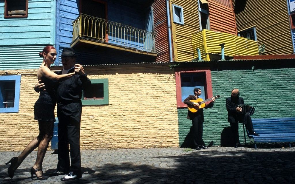 A couple dances the Tango on the street in Buenos Aires (photo credit: Serge Attal/Flash90)