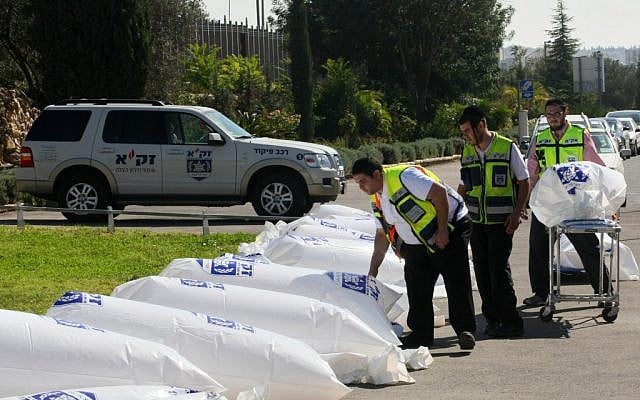 For Road Safety Day in November 2009, ZAKA, an organization that identifies victims of terror attacks and other tragedies, lined the road leading to the Knesset with hundreds of body bags to display the results of road accidents. (photo credit: Kobi Gideon/Flash90)