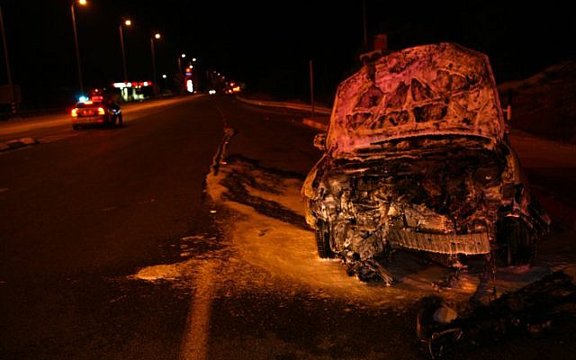 An illustrative photo of a car that was burnt after an accident (photo credit: Chen Leopold/Flash90)