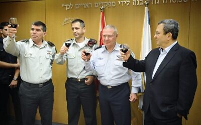 Former IDF chief of General Staff Gabi Ashkenazi (first from left), former Military Intelligence chief Amos Yadlin (second from right) and Defense Minister Ehud Barak at a ceremony in 2010. (photo credit: IDF Spokesman's Office/Flash90)
