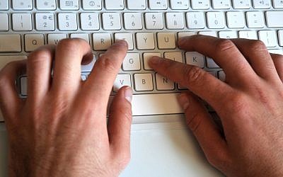 Typing on a computer (Sophie Gordon/Flash 90)