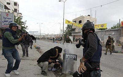 Protests at Qalandiya in 2011. (photo credit: Nati Shohat/Flash90) Protests at Qalandiya in 2011. (photo credit: Nati Shohat/Flash90)