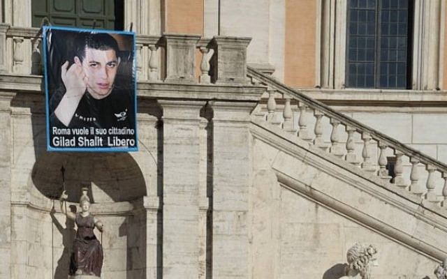 A picture of Gilad Shalit hung on Rome's city hall during the soldier's captivity. (photo credit: Amos Ben Gershom/GPO)