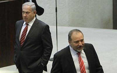 Prime Minister Benjamin Netanyahu, left, and Foreign Minister Avigdor Liberman pictured in the Knesset in 2011 (photo credit: Miriam Alster/Flash90)