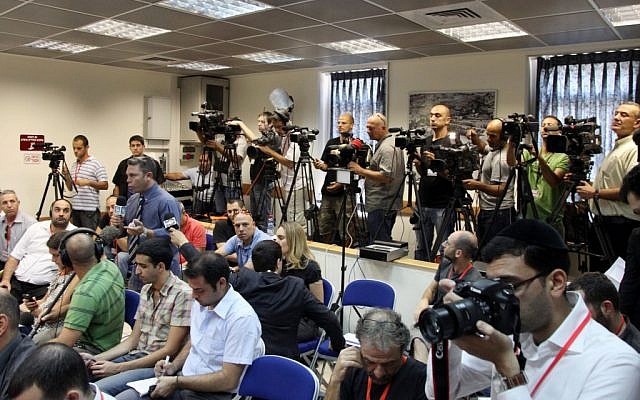 Reporters and photographers await a press conference in Jerusalem (photo credit: Mark Israel Sellem/Flash90) Reporters and photographers await a press conference in Jerusalem (photo credit: Mark Israel Sellem/Flash90)