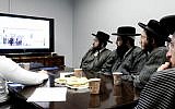 Members of the ultra-Orthodox Toldot Aharon community attend a computer and Internet lecture in Ramat Gan, after receiving authorization from their rabbis. (Yossi Zeliger/Flash90)