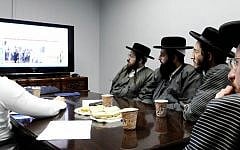 Members of the ultra-Orthodox Toldot Aharon community attend a computer and Internet lecture in Ramat Gan, after receiving authorization from their rabbis. (Yossi Zeliger/Flash90)