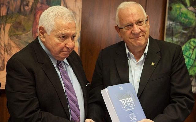 State Comptroller Micha Lindenstrauss (R) hands his annual report to Knesset Speaker Reuven Rivlin on June 2, 2012. (Uri Lenz/Flash90)