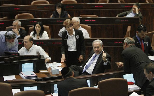 Prime Minister Benjamin Netanyahu seen in the Knesset's assembly hall late Monday night (photo credit: Miriam Alster/Flash90) Prime Minister Benjamin Netanyahu seen in the Knesset's assembly hall late Monday night (photo credit: Miriam Alster/Flash90)