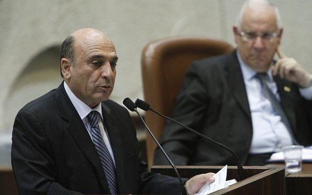 Shaul Mofaz speaking in the Knesset as Rueven Rivlin looks on Monday (photo credit:  Miriam Alster/Flash90)