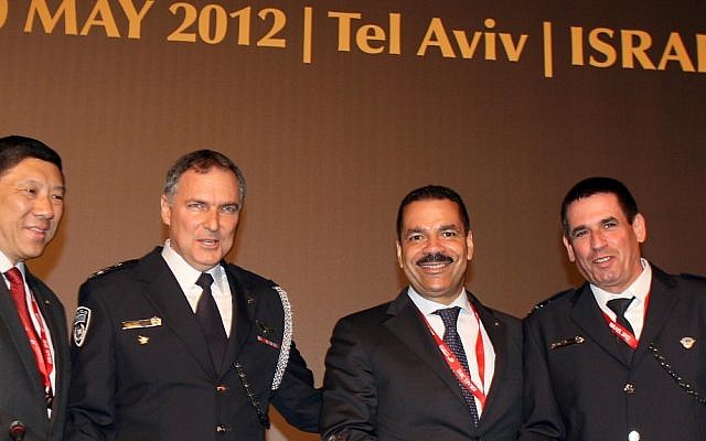 L to R: Interpol's president Khoo Boon Hui, Israeli police chief Yochanan Danino, Noble Secretary General of Interpol Ronald Kenneth, and Yoav Segalovitz, head of Police Intelligence, at the Interpol Conference in Tel Aviv earlier this month (Photo credit: Gideon Markowicz/Flash90