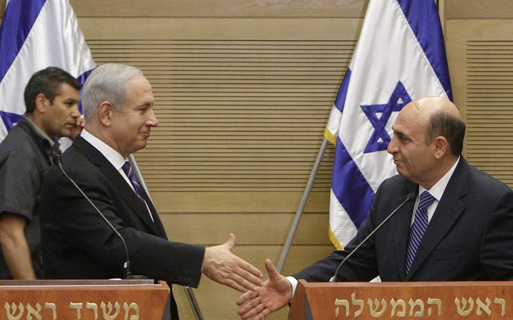 Prime Minister Benjamin Netanyahu and Shaul Mofaz at their joint press conference Tuesday (photo credit: Miriam Alster/Flash90) Prime Minister Benjamin Netanyahu and Shaul Mofaz at their joint press conference Tuesday (photo credit: Miriam Alster/Flash90)