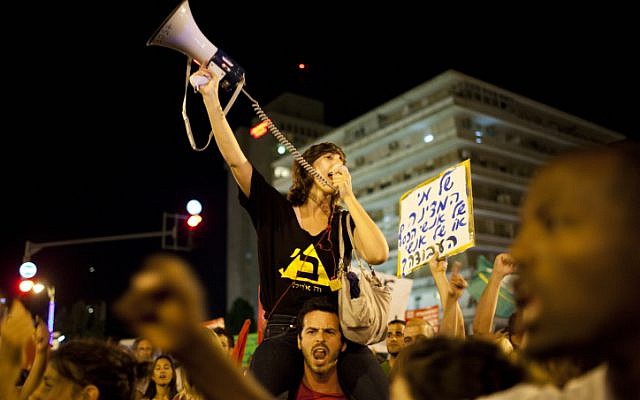 Demonstrators take part in a protest march against rising living cost in Jerusalem, Saturday (photo credit: Yonatan Sindel/Flash90)