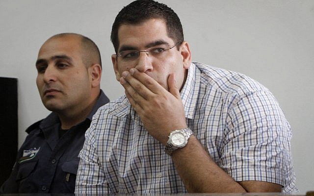 Daniel Maoz in the Jerusalem District court Monday, facing charges of murdering his parents in their home in the Ramot neighborhood of Jerusalem (photo credit: Miriam Alster/Flash90) Daniel Maoz in the Jerusalem District court Monday, facing charges of murdering his parents in their home in the Ramot neighborhood of Jerusalem (photo credit: Miriam Alster/Flash90)