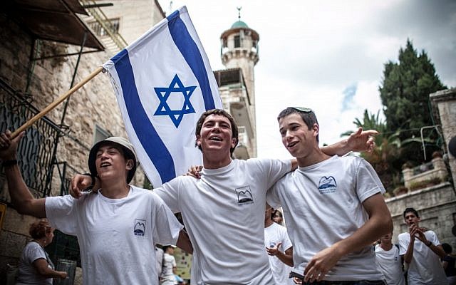Yeshiva students celebrate Jerusalem Day by marching through Jerusalem's Old City on Sunday (photo credit: Noam Moskowitz/Flash90) Yeshiva students celebrate Jerusalem Day by marching through Jerusalem's Old City on Sunday (photo credit: Noam Moskowitz/Flash90)