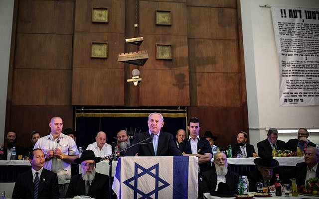 Prime Minister Netanyahu attends a Jerusalem Day celebration at the Mercaz Harav Yeshiva, a bastion of the National Religious camp, on Sunday (photo credit: Noam Moskowitz/Flash90)